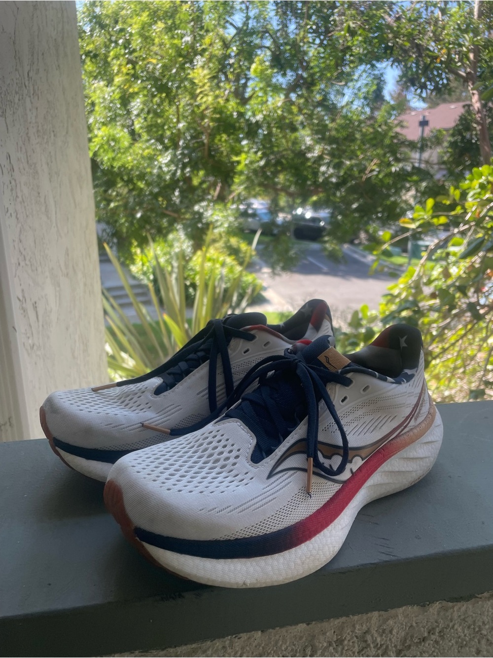 Saucony White Running Shoes with Navy & Red Highlights
